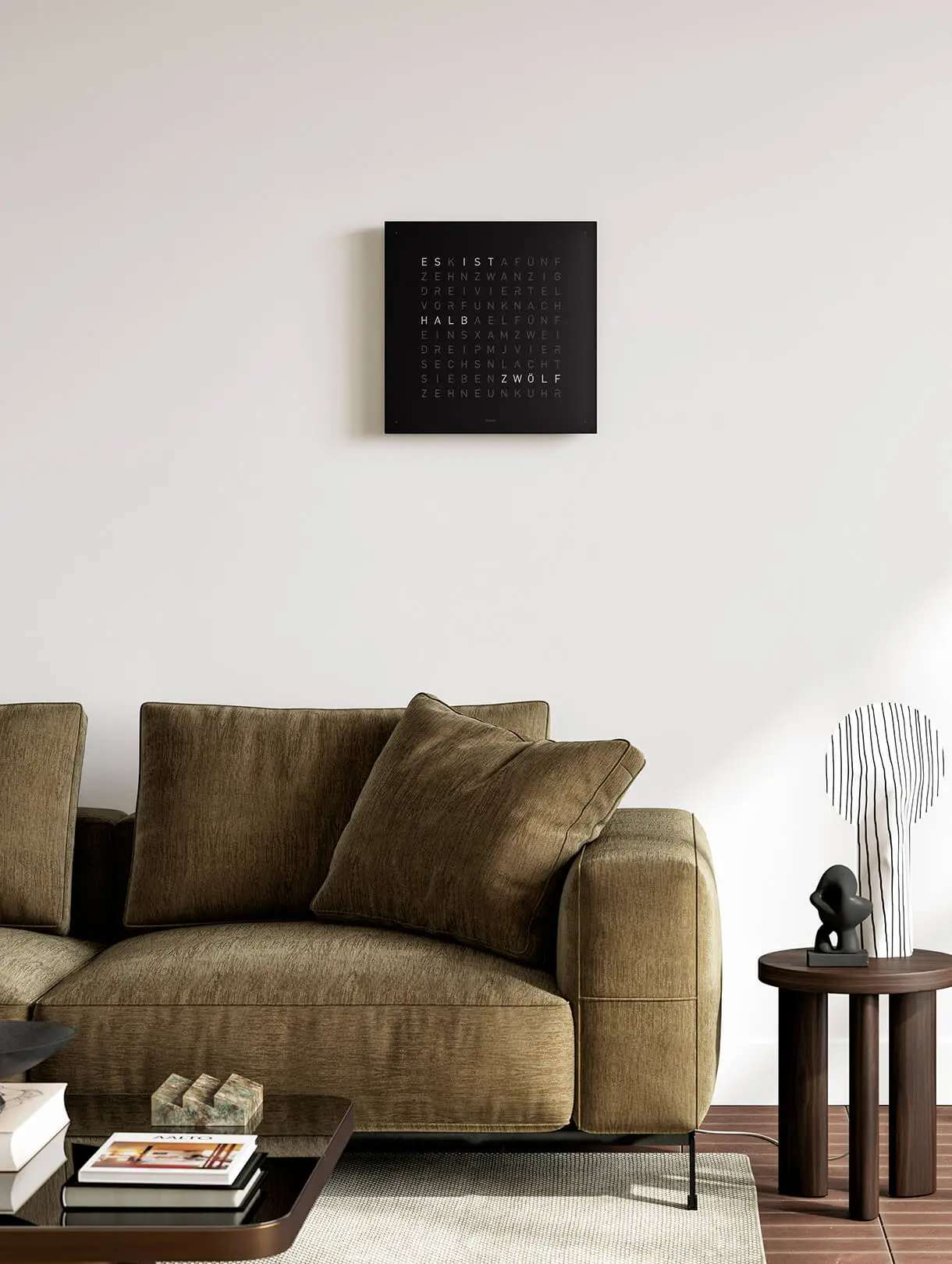 QLOCKTWO EARTH 45 Black Pepper word clock with black finish displayed in a modern living room