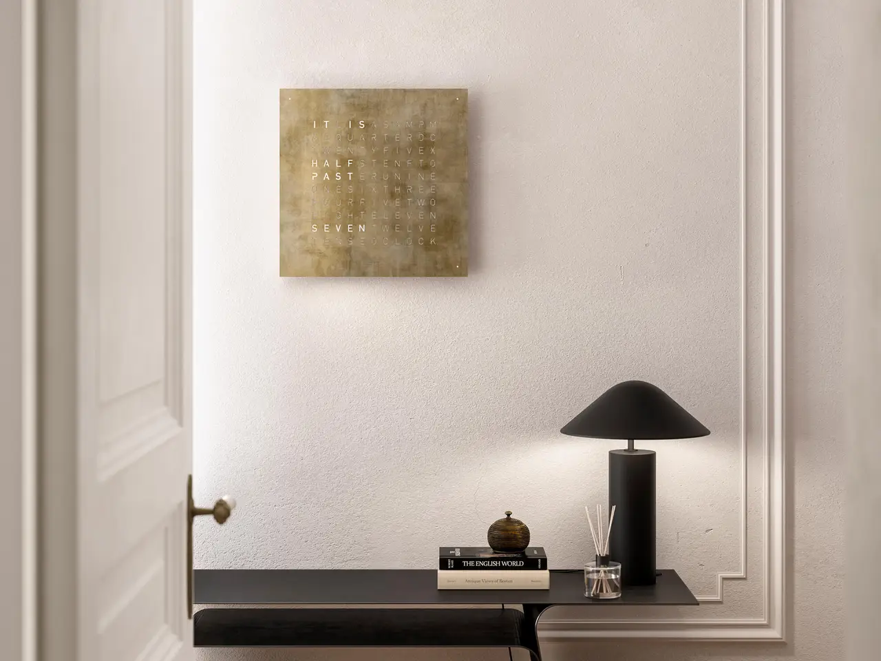 QLOCKTWO EARTH 45 Creator's Edition Silver & Gold word clock with precious metal surface in a luxury interior handcrafted with silver and gold leaf