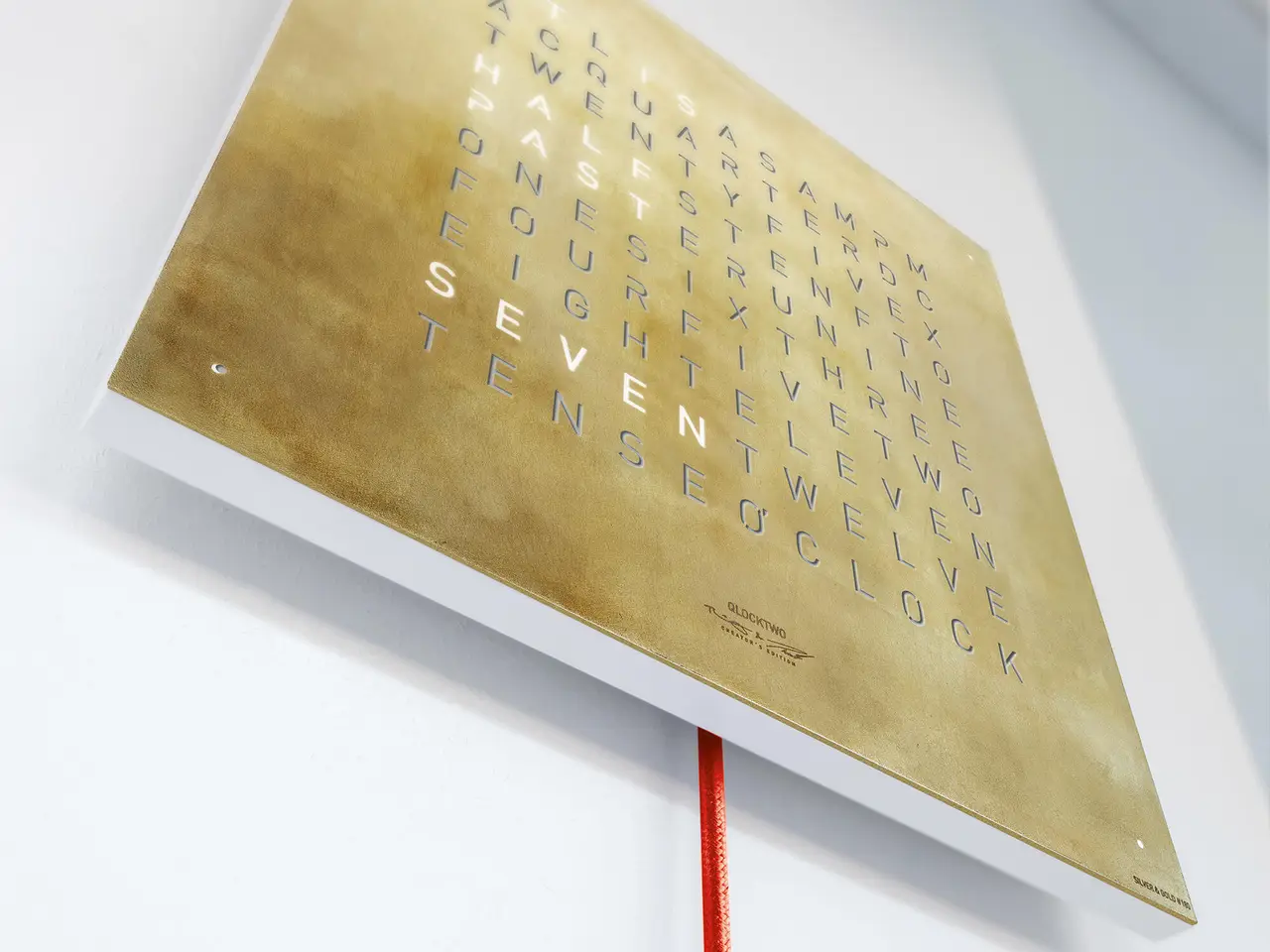 QLOCKTWO EARTH 45 Creator's Edition Silver & Gold word clock with precious metal surface in a luxury interior handcrafted with silver and gold leaf